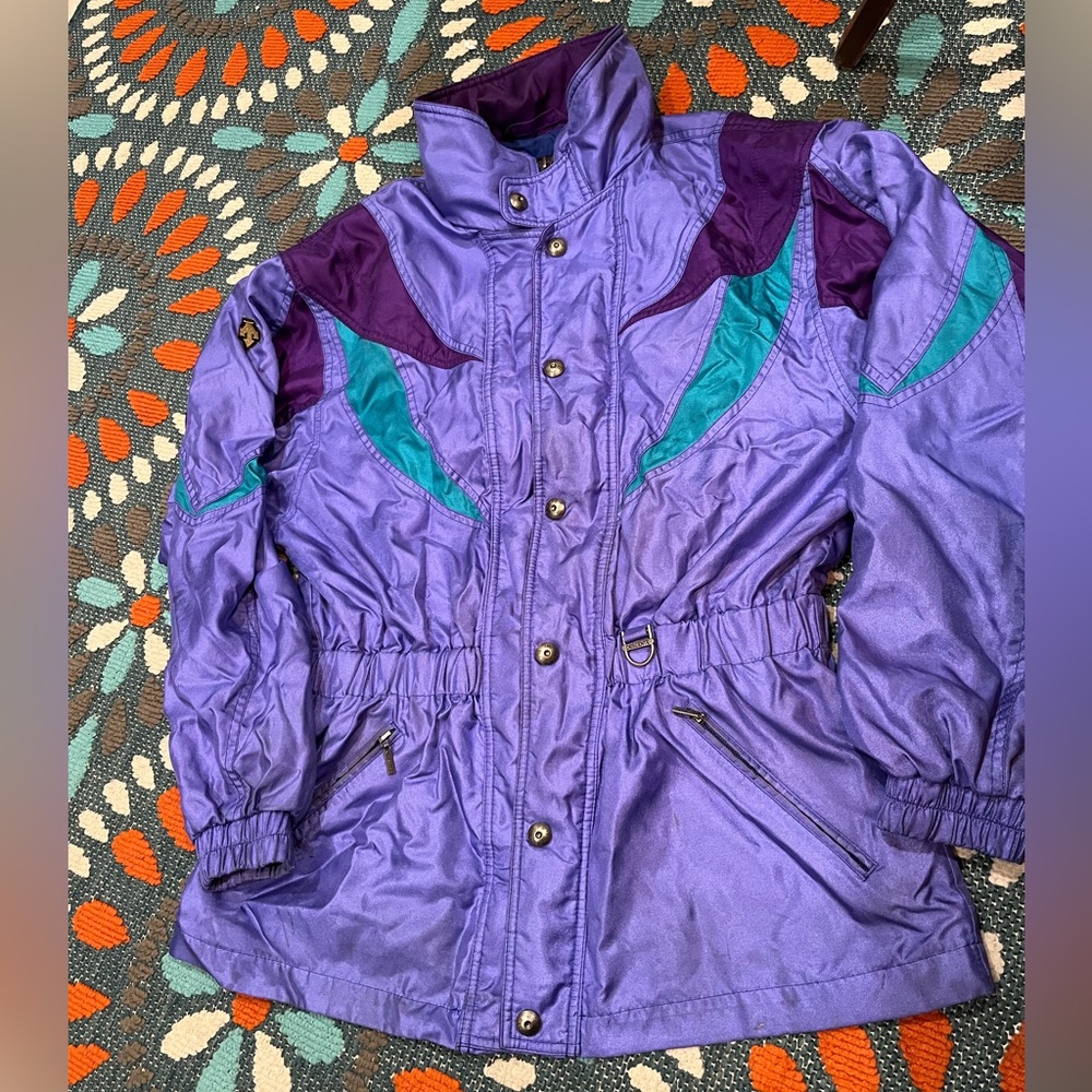 Descente Purple and Teal Ski Jacket 21” shoulder to shoulder 28” long.